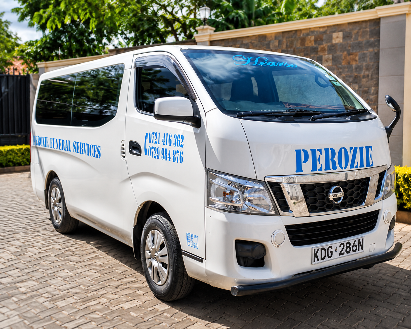 Nissan NV350 Van Hearse, white, with Perozie Funeral Services branding