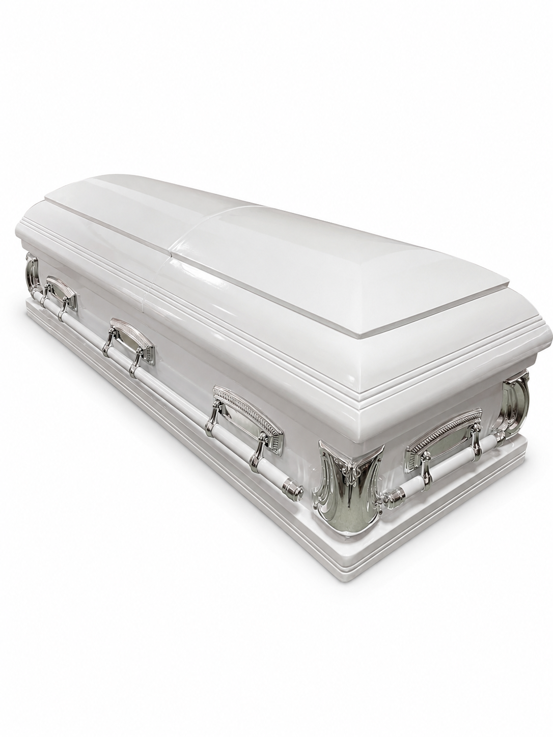 White casket with ornate silver-tone hardware and corner accents